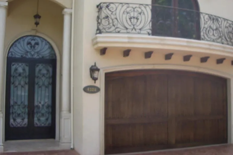 Arched wood garage door